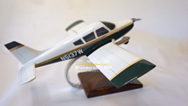 Model of Piper PA-28 Cherokee with detailed craftsmanship.